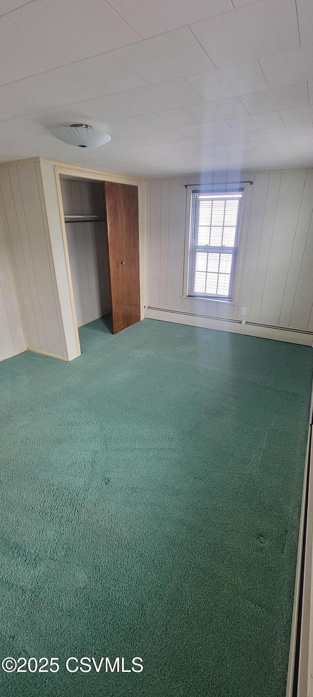 unfurnished bedroom with carpet flooring