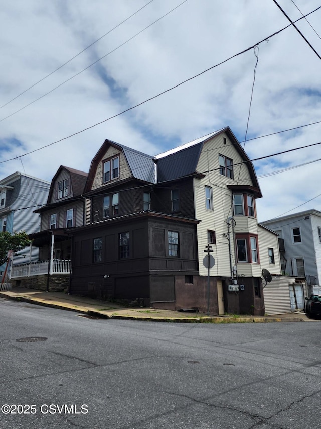 800 E Sunbury St, Shamokin, PA 17872 - colonial inspired home featuring a gambrel roof and metal roof