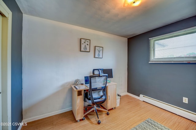 1030 Ruthann Dr, Berwick, PA 18603 - office space with a baseboard radiator, wood finished floors, and baseboards