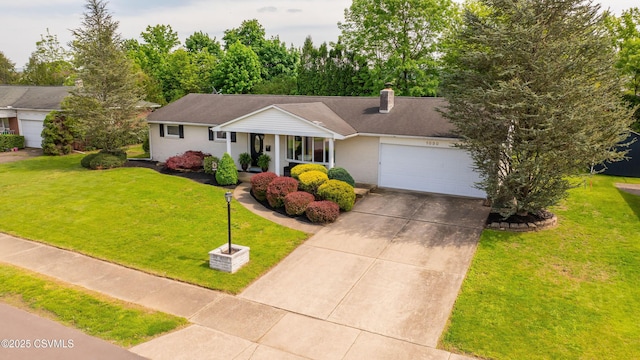 1030 Ruthann Dr, Berwick, PA 18603 - view of front of house featuring a garage, concrete driveway, a front lawn, and a chimney