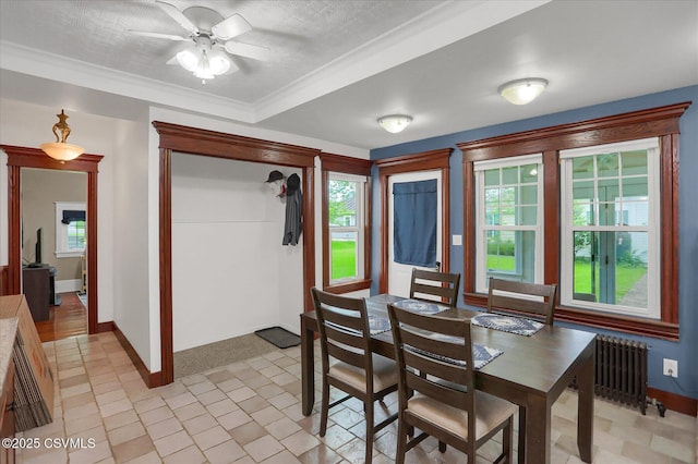 288 Broadway St, Turbotville, PA 17772 - dining space with radiator heating unit, baseboards, plenty of natural light, ceiling fan, and a textured ceiling