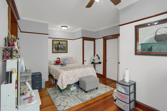 288 Broadway St, Turbotville, PA 17772 - bedroom with wood finished floors, ornamental molding, and ceiling fan