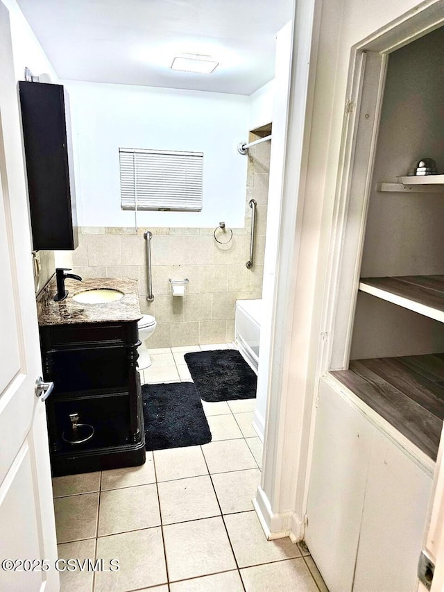 43 Red Oak Dr, Danville, PA 17821 - bathroom featuring tile patterned flooring, vanity, toilet, and shower / bathtub combination