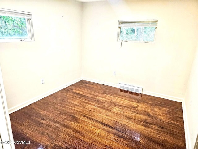 43 Red Oak Dr, Danville, PA 17821 - empty room featuring wood finished floors, plenty of natural light, and baseboards
