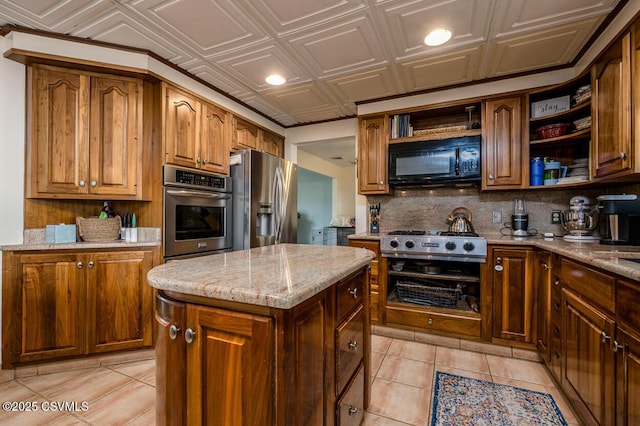 937 E 10th St, Berwick, PA 18603 - kitchen with appliances with stainless steel finishes, open shelves, light tile patterned floors, light stone countertops, and an ornate ceiling