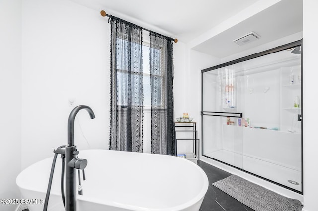 937 E 10th St, Berwick, PA 18603 - full bath with a shower stall, a soaking tub, and a sink