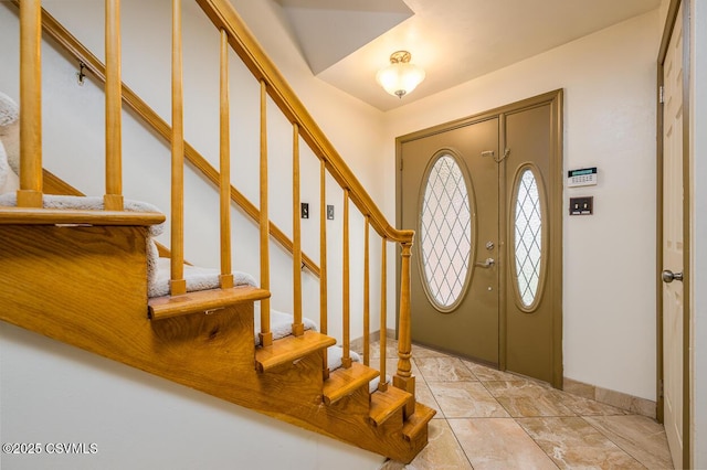 937 E 10th St, Berwick, PA 18603 - foyer entrance featuring stairs and baseboards