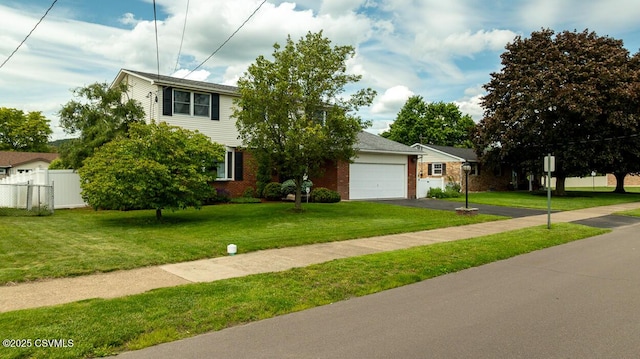 937 E 10th St, Berwick, PA 18603 - view of front of home featuring driveway, brick siding, and an attached garage
