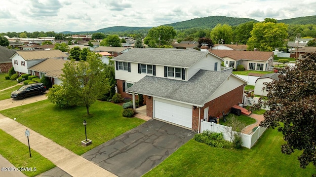 937 E 10th St, Berwick, PA 18603 - aerial view of residential area with a mountainous background