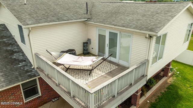 937 E 10th St, Berwick, PA 18603 - exterior view of a shingled roof, a downspout, and gutters