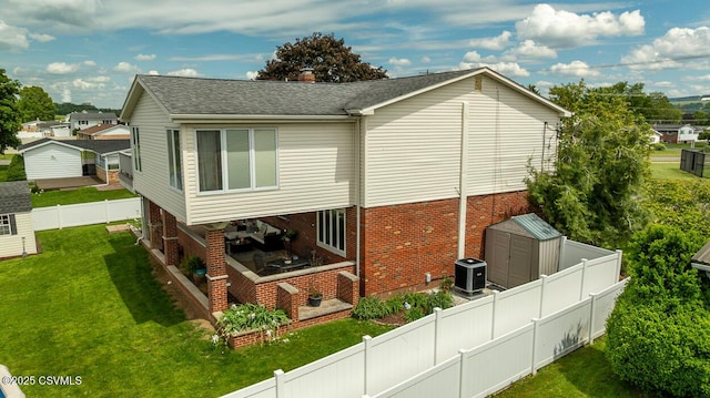 937 E 10th St, Berwick, PA 18603 - view of side of property with brick siding and central AC