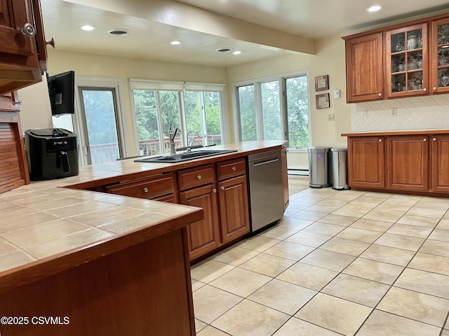 3014 Smoketown Rd, Lewisburg, PA 17837 - kitchen with dishwasher, a sink, brown cabinetry, decorative backsplash, and recessed lighting