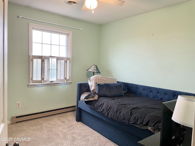 3014 Smoketown Rd, Lewisburg, PA 17837 - bedroom with a baseboard heating unit, carpet flooring, baseboards, and ceiling fan