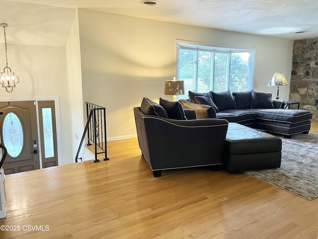 3014 Smoketown Rd, Lewisburg, PA 17837 - living area with light wood-style floors and a chandelier
