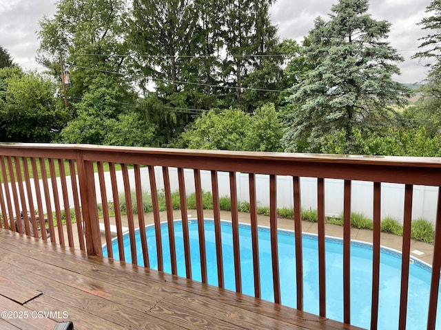 3014 Smoketown Rd, Lewisburg, PA 17837 - deck featuring an outdoor pool and view of scattered trees