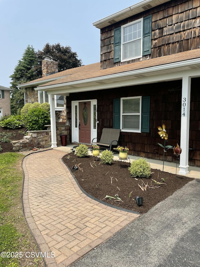 3014 Smoketown Rd, Lewisburg, PA 17837 - view of front of property featuring a chimney and covered porch