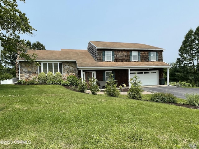 3014 Smoketown Rd, Lewisburg, PA 17837 - view of front of home with driveway, a garage, a front lawn, and stone siding