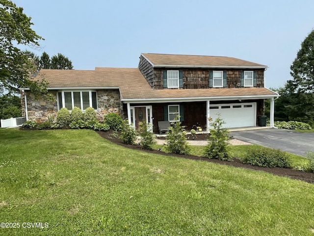 3014 Smoketown Rd, Lewisburg, PA 17837 - view of front of home featuring driveway, a garage, a front yard, and stone siding