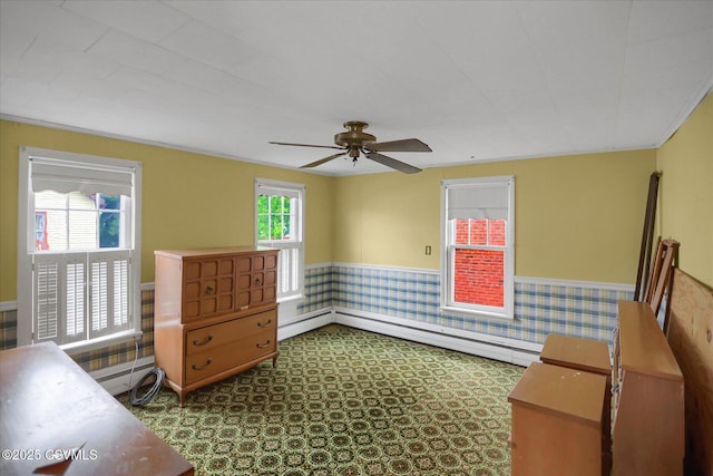 205 N Water St, Selinsgrove, PA 17870 - unfurnished room with a wainscoted wall, baseboard heating, and a ceiling fan