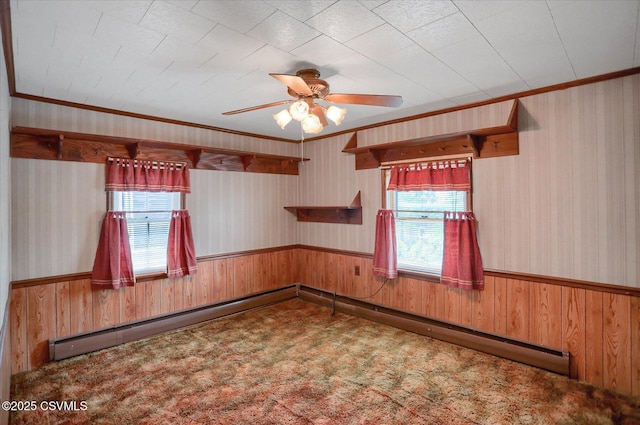 205 N Water St, Selinsgrove, PA 17870 - spare room with a wainscoted wall, ceiling fan, wooden walls, wallpapered walls, and crown molding