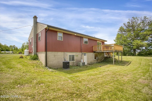 2196 Continental Blvd, Danville, PA 17821 - rear view of property with a deck, a chimney, a lawn, and central air condition unit
