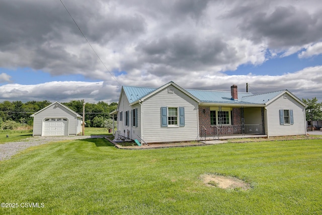 4123 Troxelville Rd, Middleburg, PA 17842 - view of front facade featuring an outbuilding, a chimney, covered porch, metal roof, and a front yard