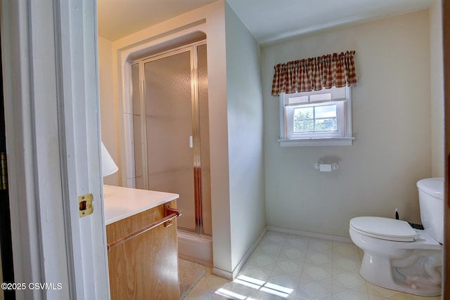4123 Troxelville Rd, Middleburg, PA 17842 - bathroom with toilet, a stall shower, vanity, and baseboards