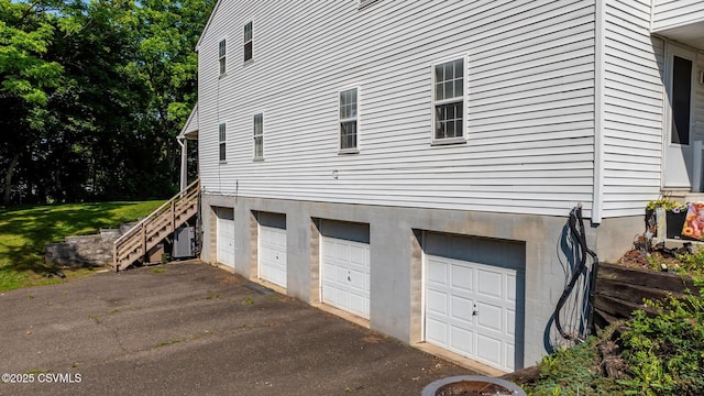 1597 N Mulberry St, Berwick, PA 18603 - garage featuring asphalt driveway