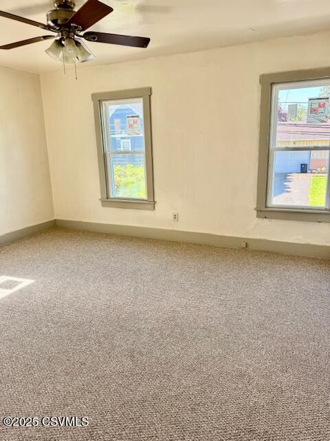 833 Line St, Sunbury, PA 17801 - spare room featuring carpet flooring, baseboards, and ceiling fan