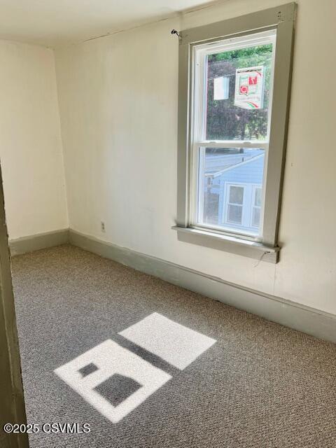 833 Line St, Sunbury, PA 17801 - carpeted spare room with baseboards