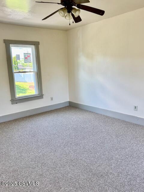 833 Line St, Sunbury, PA 17801 - empty room featuring baseboards, carpet floors, and ceiling fan
