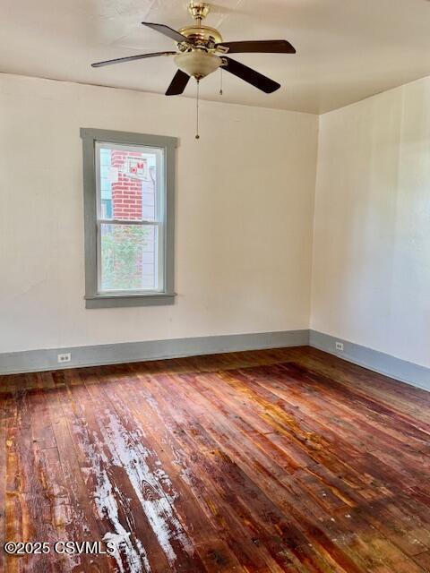 833 Line St, Sunbury, PA 17801 - empty room featuring hardwood / wood-style floors, ceiling fan, and baseboards