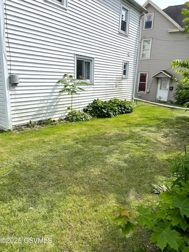 433 E 6th St, Berwick, PA 18603 - view of side of home featuring a lawn