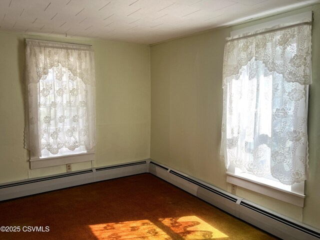 433 E 6th St, Berwick, PA 18603 - spare room with a baseboard radiator and carpet