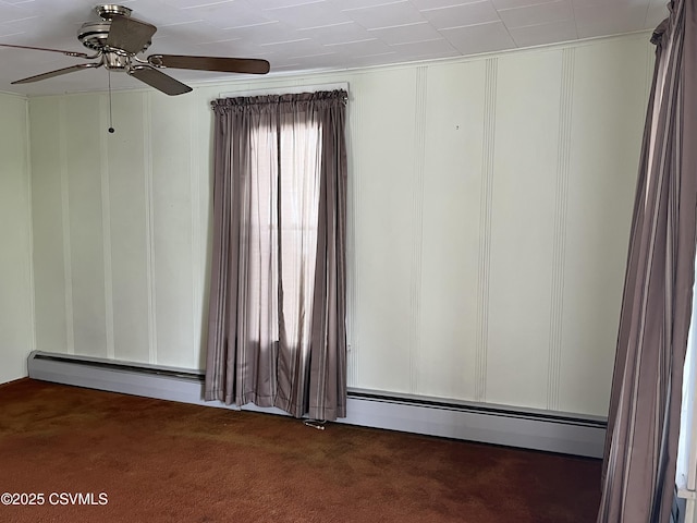 433 E 6th St, Berwick, PA 18603 - spare room with carpet, a decorative wall, a ceiling fan, and baseboard heating