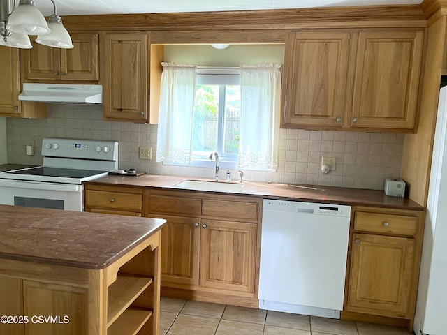 433 E 6th St, Berwick, PA 18603 - kitchen featuring white appliances, under cabinet range hood, a sink, tasteful backsplash, and light tile patterned floors