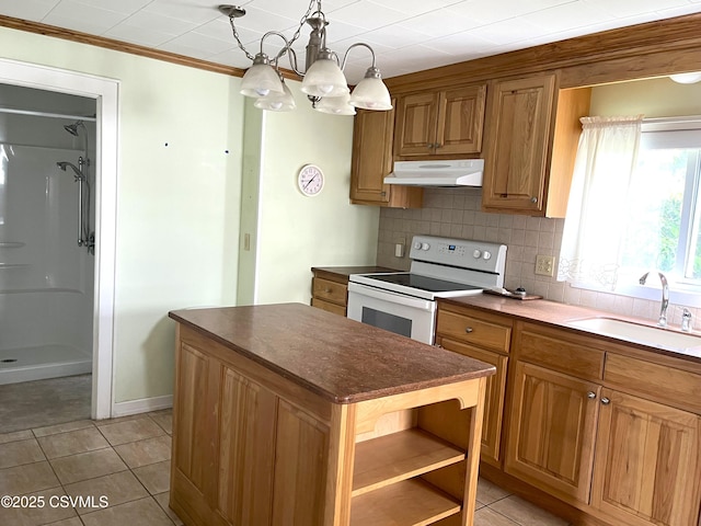 433 E 6th St, Berwick, PA 18603 - kitchen with under cabinet range hood, a sink, white range with electric stovetop, light tile patterned floors, and ornamental molding