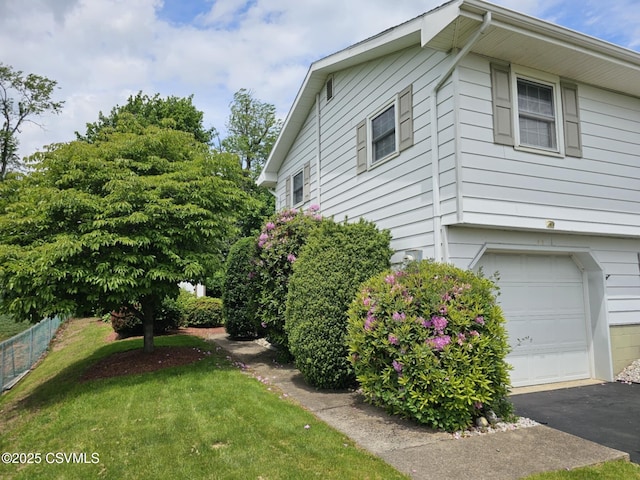 1605 W Montgomery St, Coal Township, PA 17866 - view of side of property featuring an attached garage and driveway