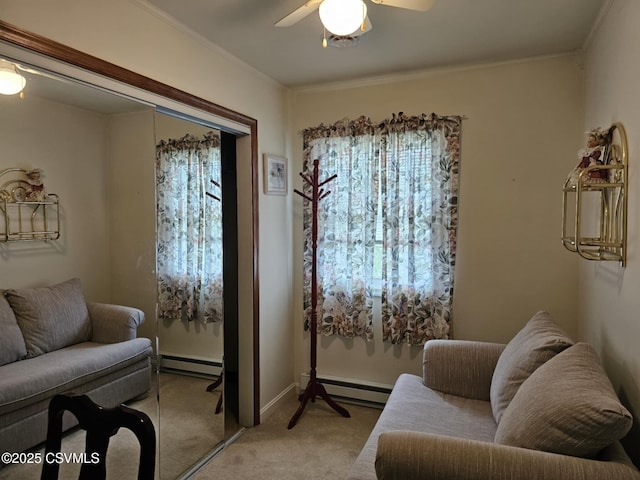 1605 W Montgomery St, Coal Township, PA 17866 - living area with a baseboard radiator, light carpet, a ceiling fan, and crown molding