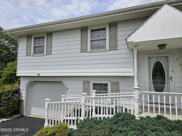 1605 W Montgomery St, Coal Township, PA 17866 - view of front of house with a garage and driveway