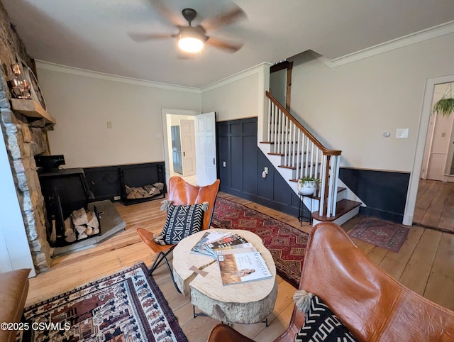 2852 State Route 487, Orangeville, PA 17859 - living area featuring hardwood / wood-style floors, ceiling fan, stairs, and crown molding