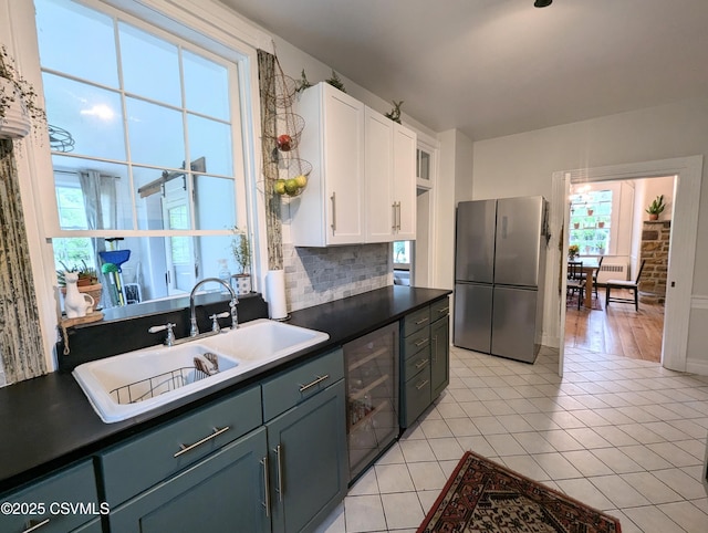 2852 State Route 487, Orangeville, PA 17859 - kitchen with freestanding refrigerator, a sink, plenty of natural light, and beverage cooler