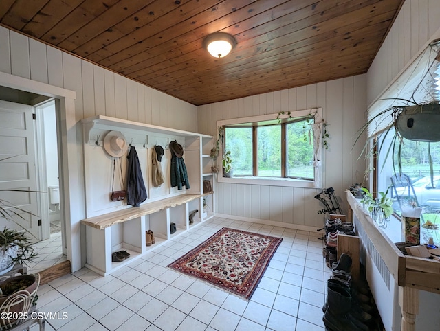 2852 State Route 487, Orangeville, PA 17859 - mudroom featuring light tile patterned floors, wooden walls, and wood ceiling