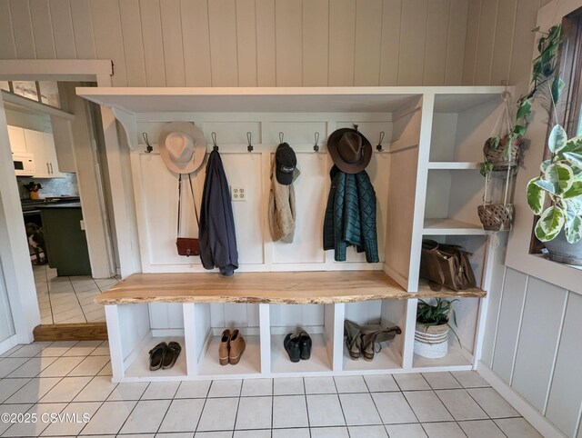 2852 State Route 487, Orangeville, PA 17859 - mudroom with light tile patterned floors and wood walls