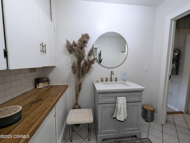 2852 State Route 487, Orangeville, PA 17859 - bathroom with tasteful backsplash, vanity, and tile patterned flooring