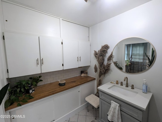 2852 State Route 487, Orangeville, PA 17859 - bathroom featuring backsplash, vanity, and tile patterned floors