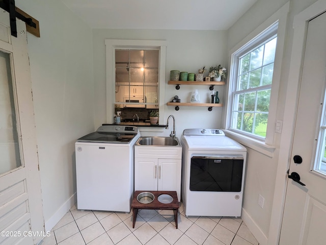 2852 State Route 487, Orangeville, PA 17859 - laundry room featuring cabinet space, separate washer and dryer, baseboards, and light tile patterned floors