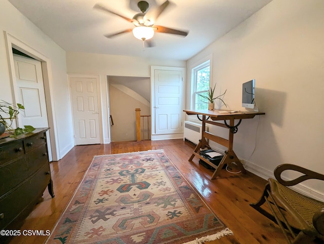 2852 State Route 487, Orangeville, PA 17859 - entrance foyer with radiator heating unit, wood-type flooring, ceiling fan, and baseboards