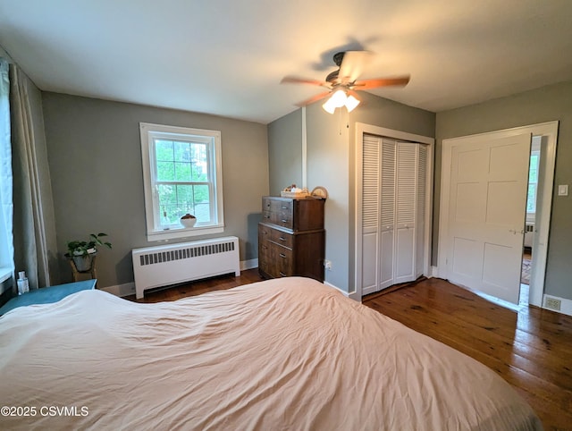 2852 State Route 487, Orangeville, PA 17859 - bedroom with radiator heating unit, hardwood / wood-style flooring, and baseboards