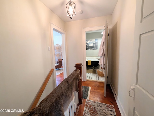 2852 State Route 487, Orangeville, PA 17859 - hallway featuring dark wood-type flooring and an upstairs landing